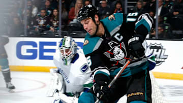 ANAHEIM, CA - FEBRUARY 13: Ryan Getzlaf #15 of the Anaheim Ducks skates with the puck as Jacob Markstrom #25 of the Vancouver Canucks holds the crease during the game on February 13, 2019 at Honda Center in Anaheim, California. (Photo by Debora Robinson/NHLI via Getty Images)