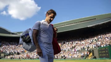 LONDON, ENGLAND - JULY 11: Roger Federer of Switzerland thanks the crowd after losing his Men's Singles Quarter-Finals match against Kevin Anderson of South Africa on day nine of the Wimbledon Lawn Tennis Championships at All England Lawn Tennis and Croquet Club on July 11, 2018 in London, England. Anderson won the match 6-2, 7-6, 5-7, 4-6, 11-13 in 4hr 13min. (Photo by Julian Finney/Getty Images)