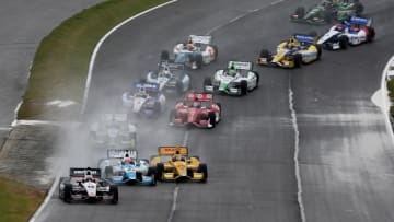 BIRMINGHAM, AL - APRIL 27: Will Power of Australia, drives the #12 Team Penske Dallara Chevrolet ahead of the pack on the first lap during the Honda Indy Car Grand Prix of Alabama at Barber Motorsports Park on April 27, 2014 in Birmingham, Alabama. (Photo by Nick Laham/Getty Images)