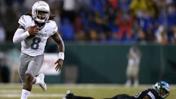 NEW ORLEANS, LA - SEPTEMBER 28: Darrell Henderson #8 of the Memphis Tigers runs with the ball for a touchdown as Thakarius Keyes #26 of the Tulane Green Wave defends during the first half at Yulman Stadium on September 28, 2018 in New Orleans, Louisiana. (Photo by Jonathan Bachman/Getty Images)