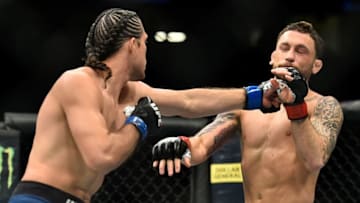 LAS VEGAS, NV - MARCH 03: (L-R) Brian Ortega punches Frankie Edgar in their featherweight bout during the UFC 222 event inside T-Mobile Arena on March 3, 2018 in Las Vegas, Nevada. (Photo by Brandon Magnus/Zuffa LLC/Zuffa LLC via Getty Images)