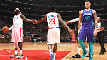 LOS ANGELES, CA - JANUARY 8: Lou Williams #23 hi-fives Montrezl Harrell #5 of the LA Clippers on January 8, 2019 at STAPLES Center in Los Angeles, California. NOTE TO USER: User expressly acknowledges and agrees that, by downloading and/or using this Photograph, user is consenting to the terms and conditions of the Getty Images License Agreement. Mandatory Copyright Notice: Copyright 2019 NBAE (Photo by Andrew D. Bernstein/NBAE via Getty Images)