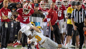 Sep 11, 2021; Bloomington, Indiana, USA; Indiana Hoosiers wide receiver D.J. Matthews Jr. (7) runs the ball against Idaho Vandals linebacker Coleman Johnson (10) during the second quarter at Memorial Stadium. Mandatory Credit: Marc Lebryk-USA TODAY Sports