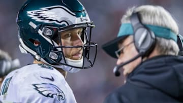 LANDOVER, MD - DECEMBER 30: Nick Foles #9 of the Philadelphia Eagles and head coach Doug Pederson discuss on the sidelines on against the Washington Redskins during the first half at FedExField on December 30, 2018 in Landover, Maryland. (Photo by Scott Taetsch/Getty Images)