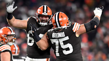 CLEVELAND, OHIO - DECEMBER 20: JC Tretter #64 and Joel Bitonio #75 of the Cleveland Browns celebrate after a touchdown in the second half of the game against the Las Vegas Raiders at FirstEnergy Stadium on December 20, 2021 in Cleveland, Ohio. (Photo by Nick Cammett/Getty Images)