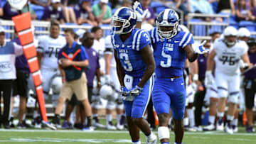 DURHAM, NC - SEPTEMBER 09: T.J. Rahming #3 and Johnathan Lloyd #5 of the Duke Blue Devils celebrate following a play against the Northwestern Wildcats at Wallace Wade Stadium on September 9, 2017 in Durham, North Carolina. (Photo by Lance King/Getty Images)