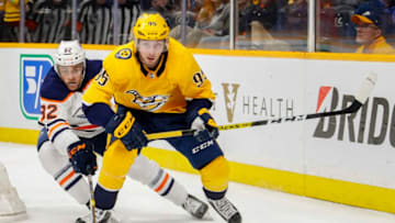 NASHVILLE, TENNESSEE - MARCH 02: Matt Duchene #95 of the Nashville Predators skates against Caleb Jones #82 of the Edmonton Oilers during the third period at Bridgestone Arena on March 02, 2020 in Nashville, Tennessee. (Photo by Frederick Breedon/Getty Images)