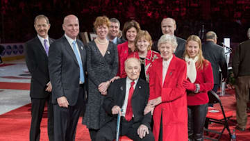 DETROIT, MI - FEBRUARY 01: Former Detroit Red Wing Leonard 'Red' Kelly (center) and wife Andra Kelly (right) with family as his No. 4 jersey was raised to the rafters during a ceremony prior to an NHL game between the Detroit Red Wings and the Toronto Maple Leafs at Little Caesars Arena on February 1, 2019 in Detroit, Michigan. (Photo by Dave Reginek/NHLI via Getty Images)