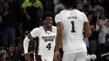 Feb 8, 2023; Starkville, Mississippi, USA; Mississippi State Bulldogs guard/forward Cameron Matthews (4) reacts after a basket during the second half against the LSU Tigers at Humphrey Coliseum. Mandatory Credit: Petre Thomas-USA TODAY Sports