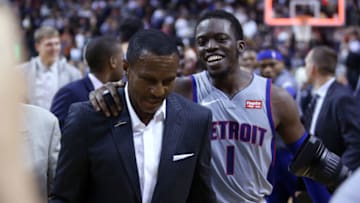 Detroit Pistons Reggie Jackson and Dwane Casey. (Photo by Vaughn Ridley/Getty Images)