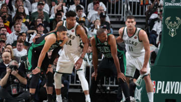 MILWAUKEE, WI - APRIL 28: Jayson Tatum #0, and Al Horford #42 of the Boston Celtics play defense against Giannis Antetokounmpo #34, and Brook Lopez #11 of the Milwaukee Bucks during Game One of the Eastern Conference Semi-Finals of the 2019 NBA Playoffs on April 28, 2019 at the Fiserv Forum Center in Milwaukee, Wisconsin. NOTE TO USER: User expressly acknowledges and agrees that, by downloading and or using this Photograph, user is consenting to the terms and conditions of the Getty Images License Agreement. Mandatory Copyright Notice: Copyright 2019 NBAE (Photo by Nathaniel S. Butler/NBAE via Getty Images).