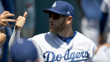 LOS ANGELES, CA - AUGUST 04: Max Muncy #13 of the Los Angeles Dodgers in the dugout before playing the San Diego Padres at Dodger Stadium on August 4, 2019 in Los Angeles, California. (Photo by John McCoy/Getty Images)