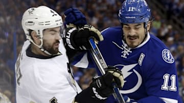 May 18, 2016; Tampa, FL, USA; Tampa Bay Lightning center Brian Boyle (11) hits Pittsburgh Penguins defenseman Justin Schultz (4) during the third period of game three of the Eastern Conference Final of the 2016 Stanley Cup Playoffs at Amalie Arena. Pittsburgh Penguins defeated the Tampa Bay Lightning 4-2. Mandatory Credit: Kim Klement-USA TODAY Sports
