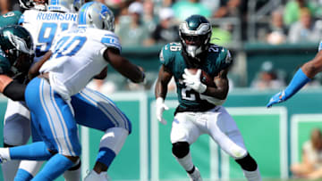 PHILADELPHIA, PENNSYLVANIA - SEPTEMBER 22: Miles Sanders #26 of the Philadelphia Eagles carries the ball as Jarrad Davis #40 of the Detroit Lions defends in the second quarter at Lincoln Financial Field on September 22, 2019 in Philadelphia, Pennsylvania. (Photo by Elsa/Getty Images)