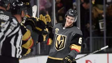 LAS VEGAS, NV - OCTOBER 21: Colin Miller #6 of the Vegas Golden Knights celebrates a goal with his teammates against the St. Louis Blues at T-Mobile Arena on October 21, 2017 in Las Vegas, Nevada. The Golden Knights won 3-2 in overtime. (Photo by David Becker/NHLI via Getty Images)