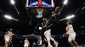 NEW YORK, NEW YORK - APRIL 12: Andre Drummond #0 of the Brooklyn Nets reacts as he falls to the baseline during the Eastern Conference 2022 Play-In Tournament against the Cleveland Cavaliers at Barclays Center on April 12, 2022 in the Brooklyn borough of New York City. The Nets won 115-108. NOTE TO USER: User expressly acknowledges and agrees that, by downloading and or using this photograph, User is consenting to the terms and conditions of the Getty Images License Agreement. (Photo by Sarah Stier/Getty Images)