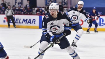Neal Pionk #4, Winnipeg Jets (Photo by Minas Panagiotakis/Getty Images)
