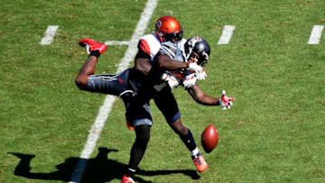 RALEIGH, NC - SEPTEMBER 30: Linebacker Jonathan Thomas #23 of the Syracuse Orange commits pass interference against tight end Jaylen Samuels #1 of the North Carolina State Wolfpack during the football game at Carter Finley Stadium on September 30, 2017 in Raleigh, North Carolina. (Photo by Mike Comer/Getty Images)