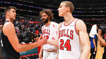 LOS ANGELES, CA - MARCH 15: Ivica Zubac #40 of the LA Clippers congratulates Lauri Markkanen #24 of the Chicago Bulls after the game on March 15, 2019 at STAPLES Center in Los Angeles, California. NOTE TO USER: User expressly acknowledges and agrees that, by downloading and/or using this Photograph, user is consenting to the terms and conditions of the Getty Images License Agreement. Mandatory Copyright Notice: Copyright 2019 NBAE (Photo by Adam Pantozzi/NBAE via Getty Images)