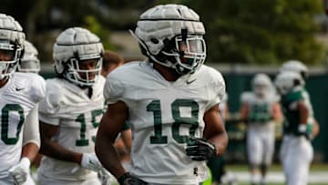 Michigan State cornerback Kalon Gervin (18) walks off the field after a drill at the team's practice facility Wednesday, Aug. 11, 2021 in East Lansing.