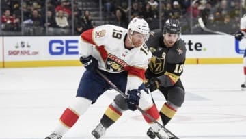 LAS VEGAS, NV - DECEMBER 17: Michael Matheson #19 of the Florida Panthers skates with the puck while James Neal #18 of the Vegas Golden Knights defends during the game at T-Mobile Arena on December 17, 2017 in Las Vegas, Nevada. (Photo by Jeff Bottari/NHLI via Getty Images)