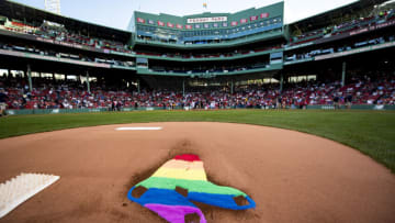 BOSTON, MA - JUNE 11: The Boston Red Sox rainbow logo is displayed in the dirt on the pitcher's mound in recognition of Pride night before a game against the Texas Rangers on June 11, 2019 at Fenway Park in Boston, Massachusetts. (Photo by Billie Weiss/Boston Red Sox/Getty Images)