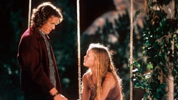 Heath Ledger and Julia Stiles at swing in a scene from the film '10 Things I Hate About You', 1999. (Photo by Buena Vista/Getty Images)
