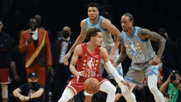 CLEVELAND, OHIO - FEBRUARY 20: Trae Young #11 of Team Durant dribbles against Team LeBron during the 2022 NBA All-Star Game at Rocket Mortgage Fieldhouse on February 20, 2022 in Cleveland, Ohio. NOTE TO USER: User expressly acknowledges and agrees that, by downloading and or using this photograph, User is consenting to the terms and conditions of the Getty Images License Agreement. (Photo by Tim Nwachukwu/Getty Images)