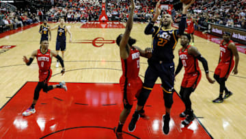 HOUSTON, TEXAS - FEBRUARY 09: Rudy Gobert #27 of the Utah Jazz shoots the ball defended by James Harden #13 of the Houston Rockets in the second half at Toyota Center on February 09, 2020 in Houston, Texas. NOTE TO USER: User expressly acknowledges and agrees that, by downloading and or using this photograph, User is consenting to the terms and conditions of the Getty Images License Agreement. (Photo by Tim Warner/Getty Images)
