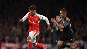 LONDON, ENGLAND - MARCH 07: Alex Oxlade-Chamberlain takes on Arturo Vidal of Bayern Munich during the UEFA Champions League Round of 16 second leg match between Arsenal FC and FC Bayern Muenchen at Emirates Stadium on March 7, 2017 in London, United Kingdom. (Photo by Stuart MacFarlane/Arsenal FC via Getty Images)