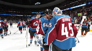 DENVER, CO - MARCH 30: Nail Yakupov #64 of the Colorado Avalanche congratulates goaltender Jonathan Bernier #45 after the game against the Chicago Blackhawks at the Pepsi Center on March 30, 2018 in Denver, Colorado. The Avalanche defeated the Blackhawks 5-0. (Photo by Michael Martin/NHLI via Getty Images)