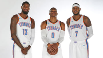 OKLAHOMA CITY, OK - SEPTEMBER 25: Paul George #13, Russell Westbrook #0 and Carmelo Anthony #7 of the Oklahoma City Thunder pose for a portrait during the 2017 NBA Media Day on September 25, 2017 at the Chesapeake Energy Arena in Oklahoma City, Oklahoma. NOTE TO USER: User expressly acknowledges and agrees that, by downloading and or using this Photograph, user is consenting to the terms and conditions of the Getty Images License Agreement. Mandatory Copyright Notice: Copyright 2017 NBAE (Photo by Layne Murdoch/NBAE via Getty Images)