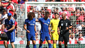 LONDON, ENGLAND - AUGUST 06: Gary Cahill of Chelsea and David Luiz of Chelsea embrace after they clash heads during the The FA Community Shield final between Chelsea and Arsenal at Wembley Stadium on August 6, 2017 in London, England. (Photo by Dan Istitene/Getty Images)