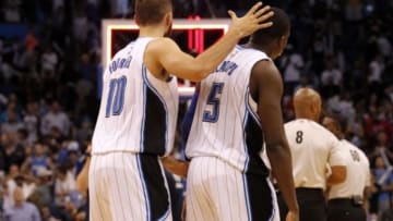 Apr 10, 2015; Orlando, FL, USA; Orlando Magic guard Victor Oladipo (5) and Orlando Magic guard Evan Fournier (10) react after their game against the Toronto Raptors at Amway Center. Toronto Raptors defeated the Orlando Magic 101-99. Mandatory Credit: Kim Klement-USA TODAY Sports