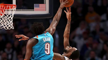 DENVER, COLORADO - FEBRUARY 26: Jerami Grant #9 of the Oklahoma City Thunder blocks Will Barton #5 of the Denver Nuggets in the first quarter at the Pepsi Center on February 26, 2019 in Denver, Colorado. NOTE TO USER: User expressly acknowledges and agrees that, by downloading and or using this photograph, User is consenting to the terms and conditions of the Getty Images License Agreement. (Photo by Matthew Stockman/Getty Images)