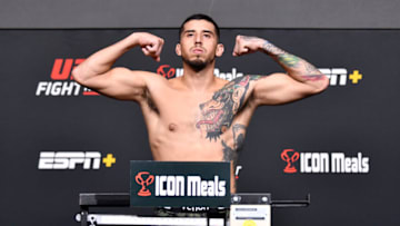 LAS VEGAS, NEVADA - OCTOBER 15: Erick Gonzalez poses on the scale during the UFC Fight Night weigh-in at UFC APEX on October 15, 2021 in Las Vegas, Nevada. (Photo by Chris Unger/Zuffa LLC)