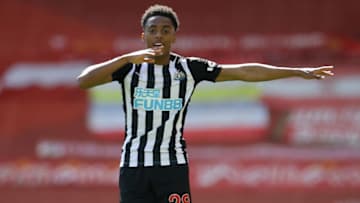 Newcastle United's English midfielder Joe Willock celebrates after scoring the equalising goal during the English Premier League football match between Liverpool and Newcastle United at Anfield in Liverpool, north west England on April 24, 2021. - - RESTRICTED TO EDITORIAL USE. No use with unauthorized audio, video, data, fixture lists, club/league logos or 'live' services. Online in-match use limited to 120 images. An additional 40 images may be used in extra time. No video emulation. Social media in-match use limited to 120 images. An additional 40 images may be used in extra time. No use in betting publications, games or single club/league/player publications. (Photo by DAVID KLEIN / POOL / AFP) / RESTRICTED TO EDITORIAL USE. No use with unauthorized audio, video, data, fixture lists, club/league logos or 'live' services. Online in-match use limited to 120 images. An additional 40 images may be used in extra time. No video emulation. Social media in-match use limited to 120 images. An additional 40 images may be used in extra time. No use in betting publications, games or single club/league/player publications. / RESTRICTED TO EDITORIAL USE. No use with unauthorized audio, video, data, fixture lists, club/league logos or 'live' services. Online in-match use limited to 120 images. An additional 40 images may be used in extra time. No video emulation. Social media in-match use limited to 120 images. An additional 40 images may be used in extra time. No use in betting publications, games or single club/league/player publications. (Photo by DAVID KLEIN/POOL/AFP via Getty Images)