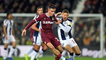 WEST BROMWICH, ENGLAND - DECEMBER 07: Dwight Gayle of West Bromwich Albion tackles Jack Grealish of Aston Villa during the Sky Bet Championship match between West Bromwich Albion and Aston Villa at The Hawthorns on December 7, 2018 in West Bromwich, England. (Photo by Gareth Copley/Getty Images)