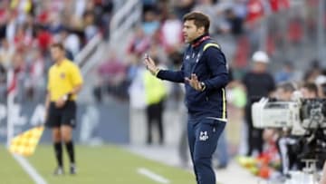 Jul 23, 2014; Toronto, Ontario, Canada; Tottenham Hotspur head coach Mauricio Pochettino on the sidelines against Toronto FC at BMO Field. Tottenham defeated Toronto 3-2. Mandatory Credit: John E. Sokolowski-USA TODAY Sports