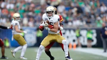 ORLANDO, FL - DECEMBER 28: Braden Lenzy #25 of the Notre Dame Fighting Irish catches a pass during the Camping World Bowl against the Iowa State Cyclones at Camping World Stadium on December 28, 2019 in Orlando, Florida. Notre Dame defeated Iowa State 33-9. (Photo by Joe Robbins/Getty Images)
