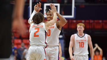 Nov 6, 2023; Champaign, Illinois, USA; Illinois Fighting Illini guard Terrence Shannon Jr. (0) and teammate Dra Gibbs-Lawhorn (2) celebrate a score during the first half at State Farm Center. Mandatory Credit: Ron Johnson-USA TODAY Sports