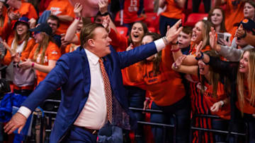 CHAMPAIGN, IL - MARCH 08: Head coach Brad Underwood of the Illinois Fighting Illini celebrates with fans following the game against the Iowa Hawkeyes at State Farm Center on March 8, 2020 in Champaign, Illinois. (Photo by Michael Hickey/Getty Images)