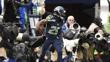 January 18, 2015; Seattle, WA, USA; Seattle Seahawks cornerback Richard Sherman (25) reacts after he intercepts a pass intended for Green Bay Packers wide receiver Davante Adams (17) during the first half in the NFC Championship game at CenturyLink Field. Mandatory Credit: Kyle Terada-USA TODAY Sports