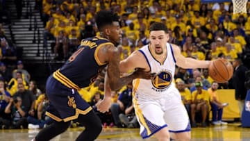 Jun 5, 2016; Oakland, CA, USA; Golden State Warriors guard Klay Thompson (11) drives to the basket against Cleveland Cavaliers guard Iman Shumpert (4) during the third quarter in game two of the NBA Finals at Oracle Arena. Mandatory Credit: Kyle Terada-USA TODAY Sports