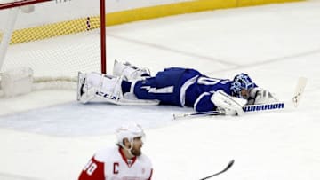 Dec 20, 2016; Tampa, FL, USA; Tampa Bay Lightning goalie Ben Bishop (30) falls to the ice after an apparent injury against the Detroit Red Wings during the first period at Amalie Arena. Mandatory Credit: Kim Klement-USA TODAY Sports