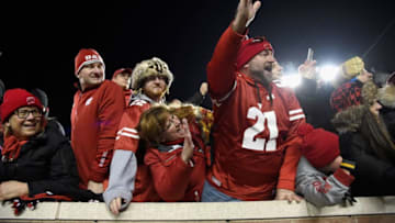 MINNEAPOLIS, MN - NOVEMBER 25: Fans wait to touch Paul Bunyan's Axe after the Wisconsin Badgers defeated the Minnesota Golden Gophers 31-0 in the game on November 25, 2017 at TCF Bank Stadium in Minneapolis, Minnesota. (Photo by Hannah Foslien/Getty Images)
