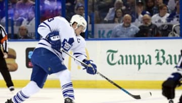 Jan 27, 2016; Tampa, FL, USA; Toronto Maple Leafs defenseman Dion Phaneuf (3) shoots against the Tampa Bay Lightning during the first period at Amalie Arena. Mandatory Credit: Kim Klement-USA TODAY Sports