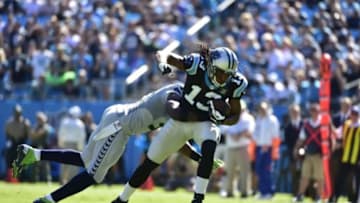 Oct 26, 2014; Charlotte, NC, USA; Carolina Panthers wide receiver Kelvin Benjamin (13) with the ball as Seattle Seahawks strong safety Kam Chancellor (31) defends in the first quarter at Bank of America Stadium. Mandatory Credit: Bob Donnan-USA TODAY Sports