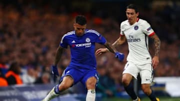 LONDON, ENGLAND - MARCH 09: Kenedy of Chelsea passes the ball as Angel Di Maria of PSG closes in during the UEFA Champions League round of 16, second leg match between Chelsea and Paris Saint Germain at Stamford Bridge on March 9, 2016 in London, United Kingdom. (Photo by Clive Rose/Getty Images)