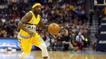Nov 25, 2014; Denver, CO, USA; Denver Nuggets guard Ty Lawson (3) drives to the basket during the first half against the Chicago Bulls at Pepsi Center. Mandatory Credit: Chris Humphreys-USA TODAY Sports